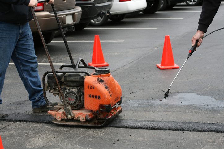 Parking Lot Maintenance in Sun City Updates Local Shop’s Asphalt Surface